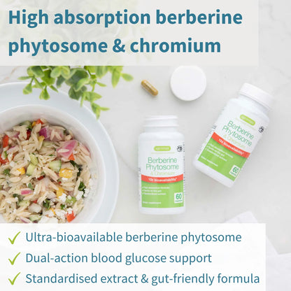 Supplement bottles labeled 'Berberine Phytosome' and 'Chromium' with a bowl of salad on a light background.