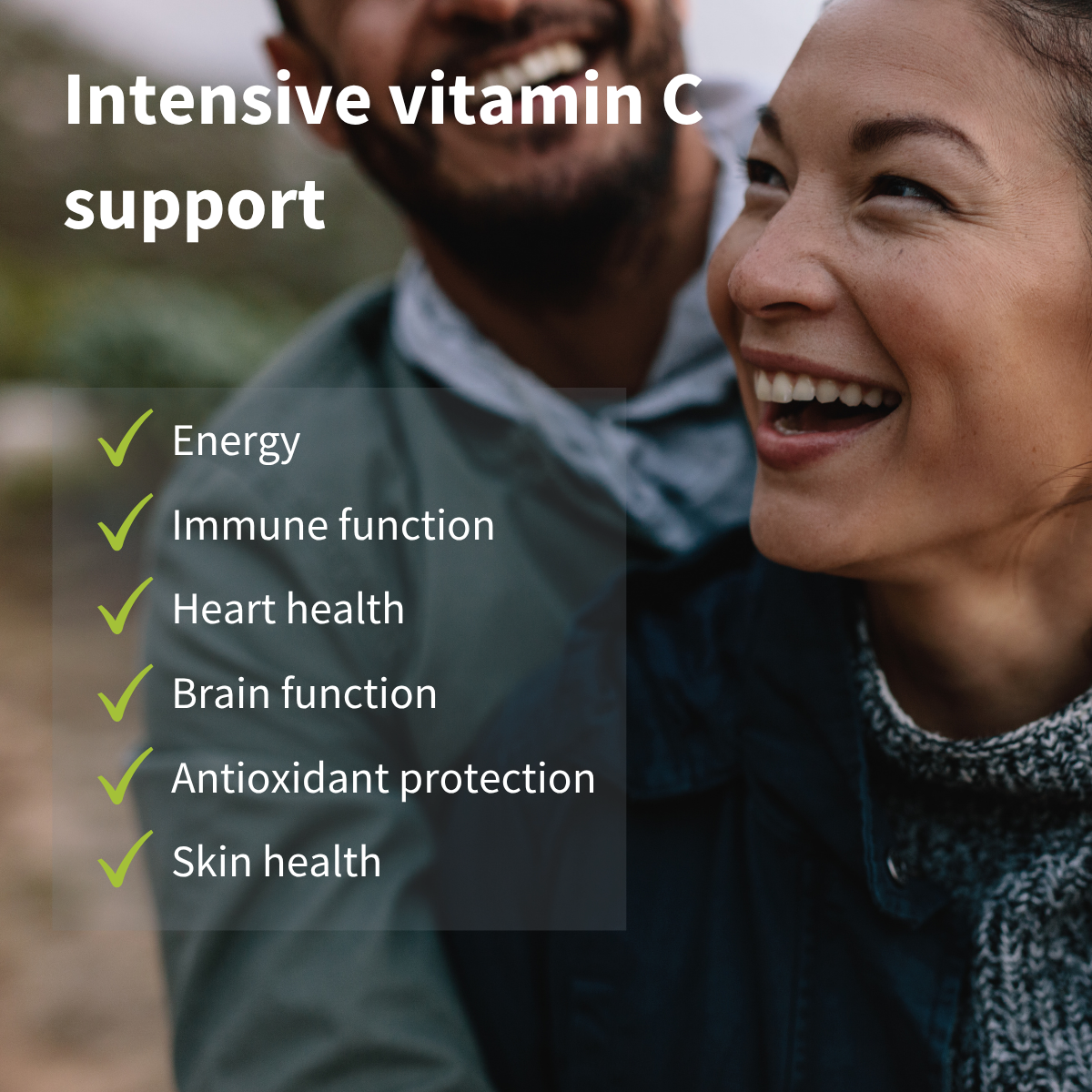 Two people smiling outdoors with text about intensive vitamin C support and its benefits.
