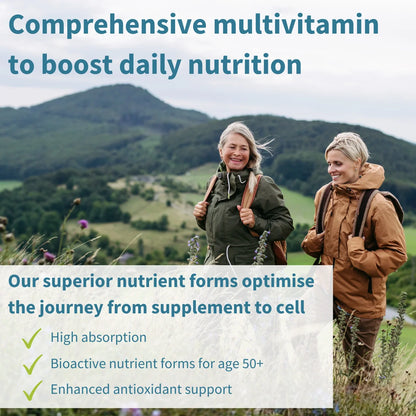 Two people hiking in a scenic landscape with text about a comprehensive multivitamin.